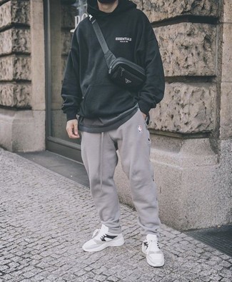 black hoodie and grey joggers